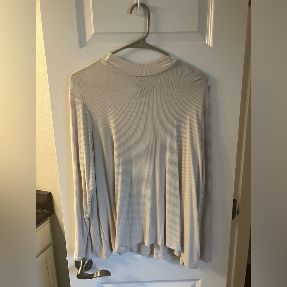 Cream colored Old Navy, high neck, long sleeve top.